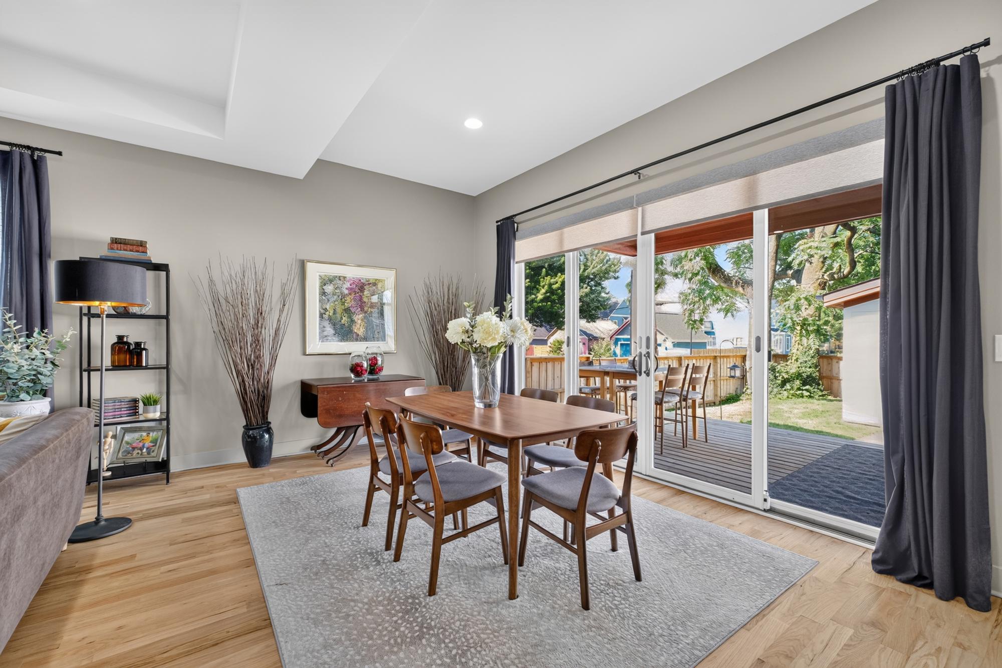 Dining area with fresh walls and sliding doors to the patio